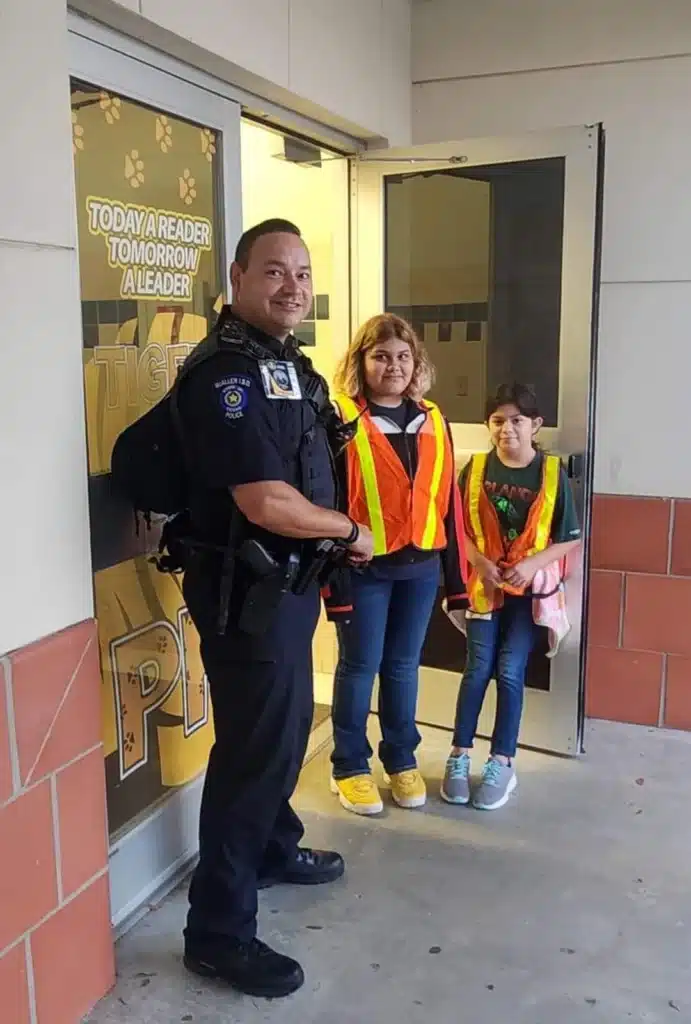 School resource officer on duty carrying a FoldAR in a standard backpack